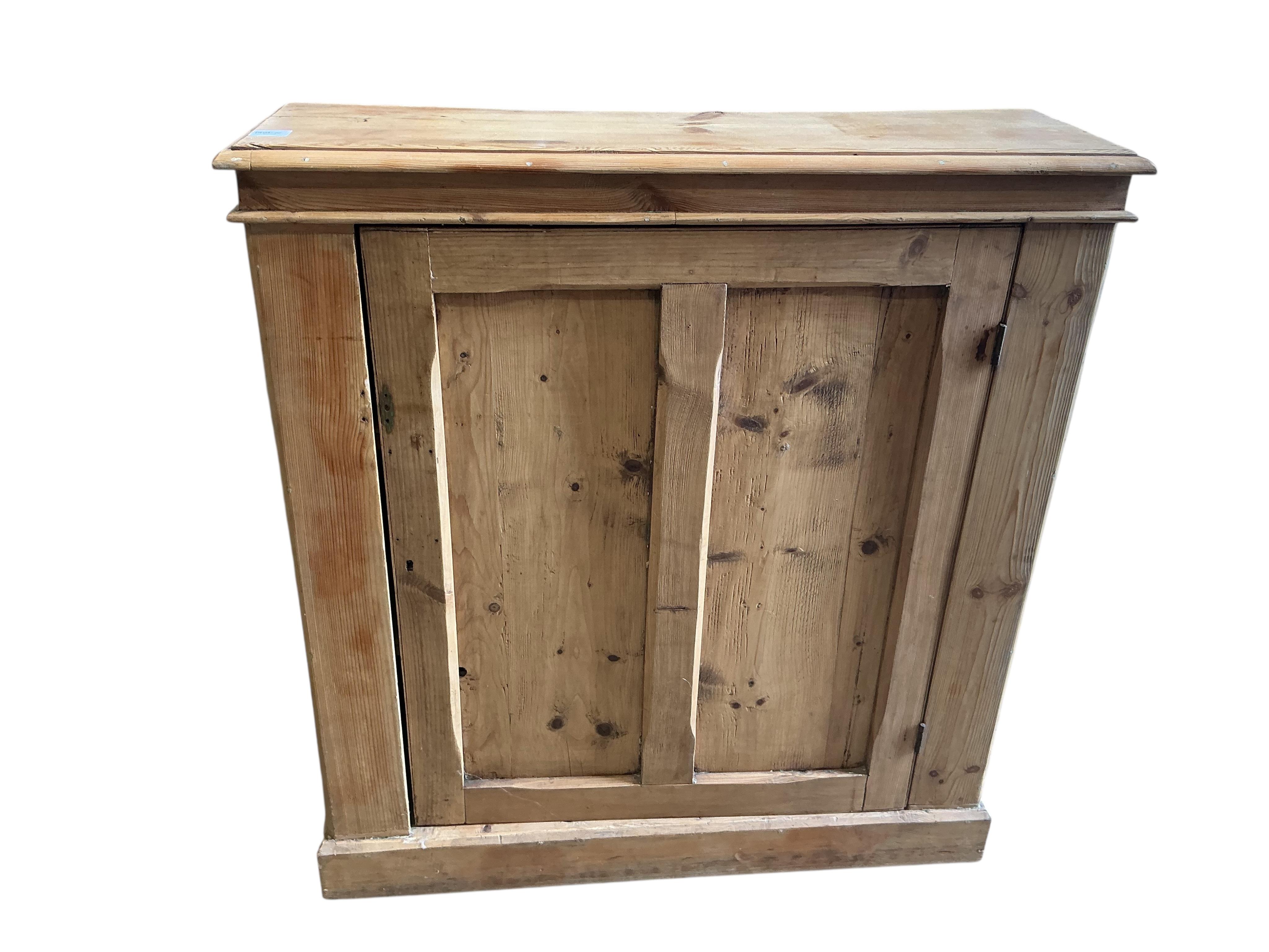 A Victorian pine single door side cabinet, width 100cm, depth 31cm, height 107cm